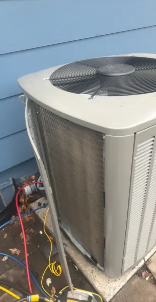 The same outdoor condenser after cleaning